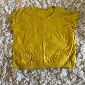Woman’s mustard yellow capped sleeve top